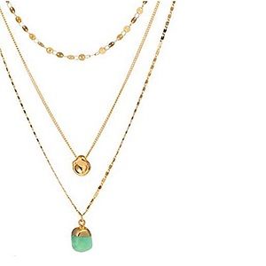 Gold stack necklace with green pendant